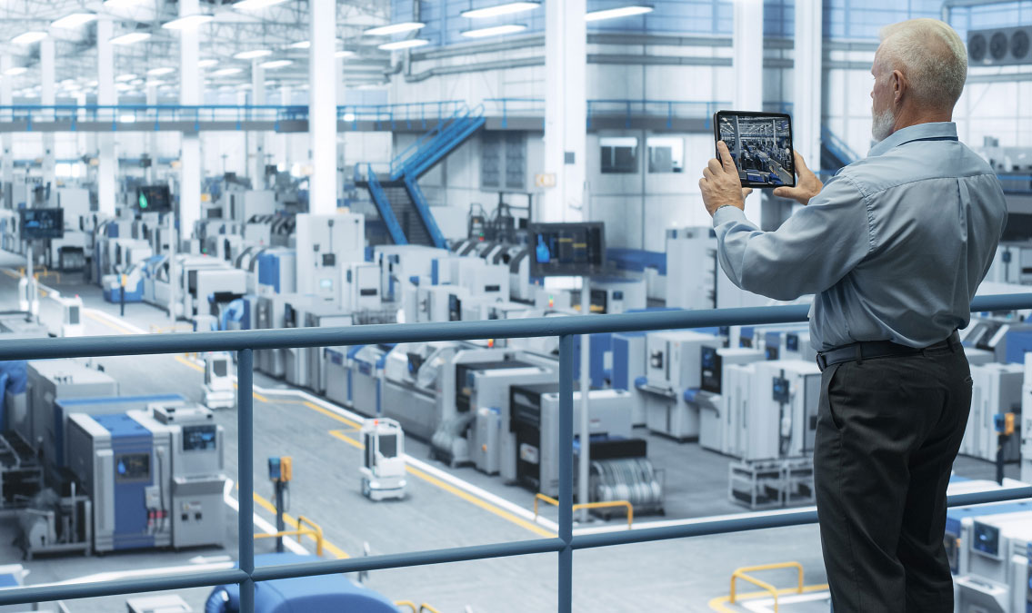 Engineer monitoring equipment undergoing autonomous maintenance using software